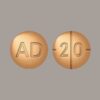 "Adderall 20mg prescription tablets in a secure pharmacy container."