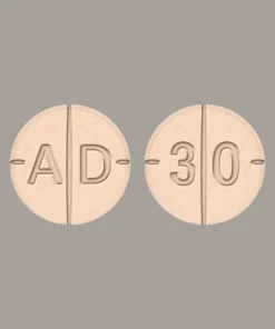 "High-strength Adderall 30mg prescription tablets inside a pharmacy bottle"