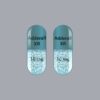 "Adderall XR 10mg extended-release capsules on a clean, professional pharmacy background"