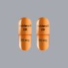 "Adderall XR 20mg extended-release capsules arranged professionally"