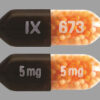 "Dexedrine Spansules 5mg capsules on a professional pharmacy surface"